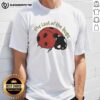 Alt Text: Hot Indie Folk Concert featuring The Last Of Bugs T-Shirt worn by fans enjoying live music and vibrant atmosphere.