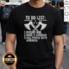 Funny 'Buy An Axe Name It Kindness' T-shirt design with humor about kindness and positivity, perfect for casual wear.