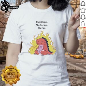 Unbothered red dinosaur graphic on a ladies tee, showcasing a fun and vibrant design for dinosaur lovers.