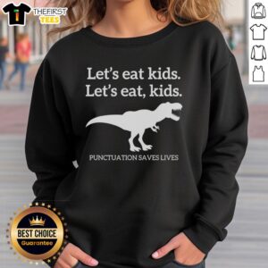 Official T-Rex Let's Eat Kids sweatshirt featuring playful dinosaur graphic and humorous punctuation message for kids.