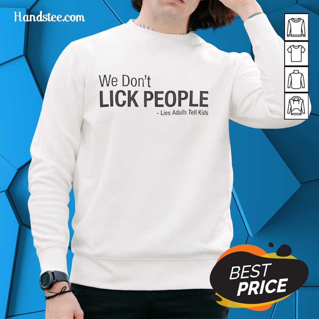 nice-we-dont-lick-people-lies-adults-tell-kids-sweatshirt Funny sweatshirt featuring 'We Don't Lick People' slogan, perfect for adults who enjoy playful humor around kids.