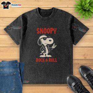 Awesome Snoopy rock and roll cartoon design on a stylish, washed t-shirt for casual fashion lovers.