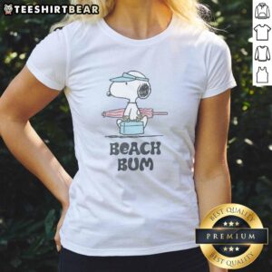 Good Peanuts Beach Bum Snoopy Ladies Tee featuring Snoopy relaxing on the beach, perfect for casual summer wear.