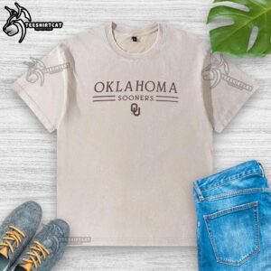 Original Oklahoma Sooners Champion washed t-shirt featuring bold team graphics and comfortable fit for fans.