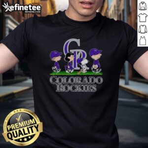 Alt Text: Snoopy, Charlie Brown, Linus, and Lucy in Colorado Rockies baseball jersey t-shirts, celebrating friendship and fun.