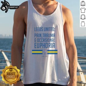 Official Leeds United tank top featuring 'Pain, Trauma, and Occasional Euphoria Since 1919' design, perfect for fans.
