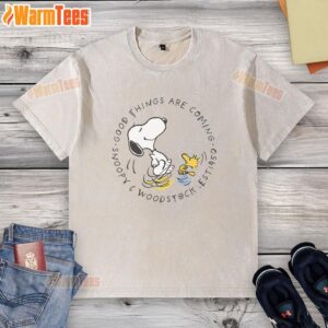 Pretty Peanuts Snoopy and Woodstock design on a washed t-shirt, perfect for fans of good things coming.
