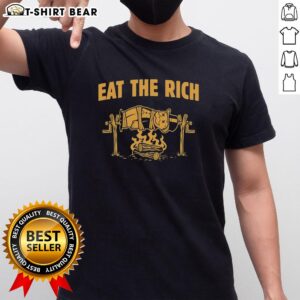 Good Rich Uncle Pennybags 'Eat The Rich' spit-roasted humor T-shirt featuring a playful graphic design.