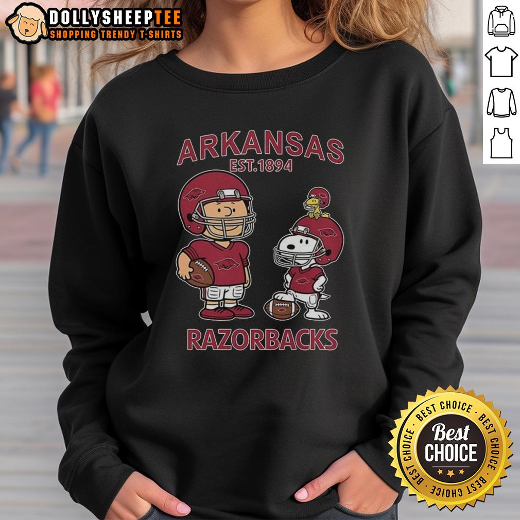 Nice Charlie Brown And Snoopy X Arkansas Razorbacks Ncaa Football Est 1894 Sweatshirt Nice Charlie Brown and Snoopy Arkansas Razorbacks NCAA Football Est 1894 Sweatshirt featuring iconic cartoon designs.