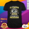 Green Bay Packers NFL t-shirt with 'I May Live In Illinois, But My Heart Belongs To Packers' slogan in bright colors.