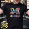 Alt Text: Michigan Wolverines NCAA collage logo t-shirt featuring vibrant designs of Michigan sports teams for fans.