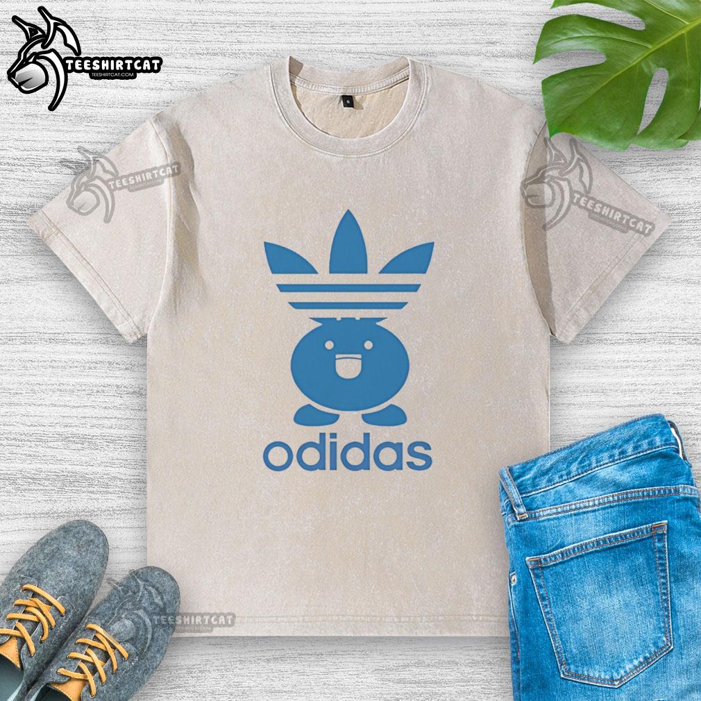 nice-odidas-pokemon-oddish-parody-washed-t-shirt Alt Text: Nice Odidas Pokemon Oddish Parody washed t-shirt featuring a playful Oddish design and vibrant colors.