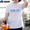 Nice Peanuts Snoopy beagle roaming in space t-shirt featuring a colorful design of Snoopy with a space backdrop.