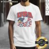 Nice Peanuts Snoopy X Us Soccer T-Shirt featuring Snoopy in a soccer jersey, perfect for fans of Peanuts and soccer.