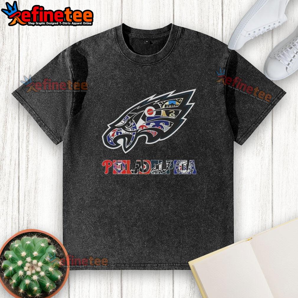 nice-philadelphia-eagles-nfl-and-philadelphia-sport-teams-collage-logo-washed-t-shirt Alt Text: Collage of Philadelphia Eagles NFL logo and other Philadelphia sports teams on a washed t-shirt design.