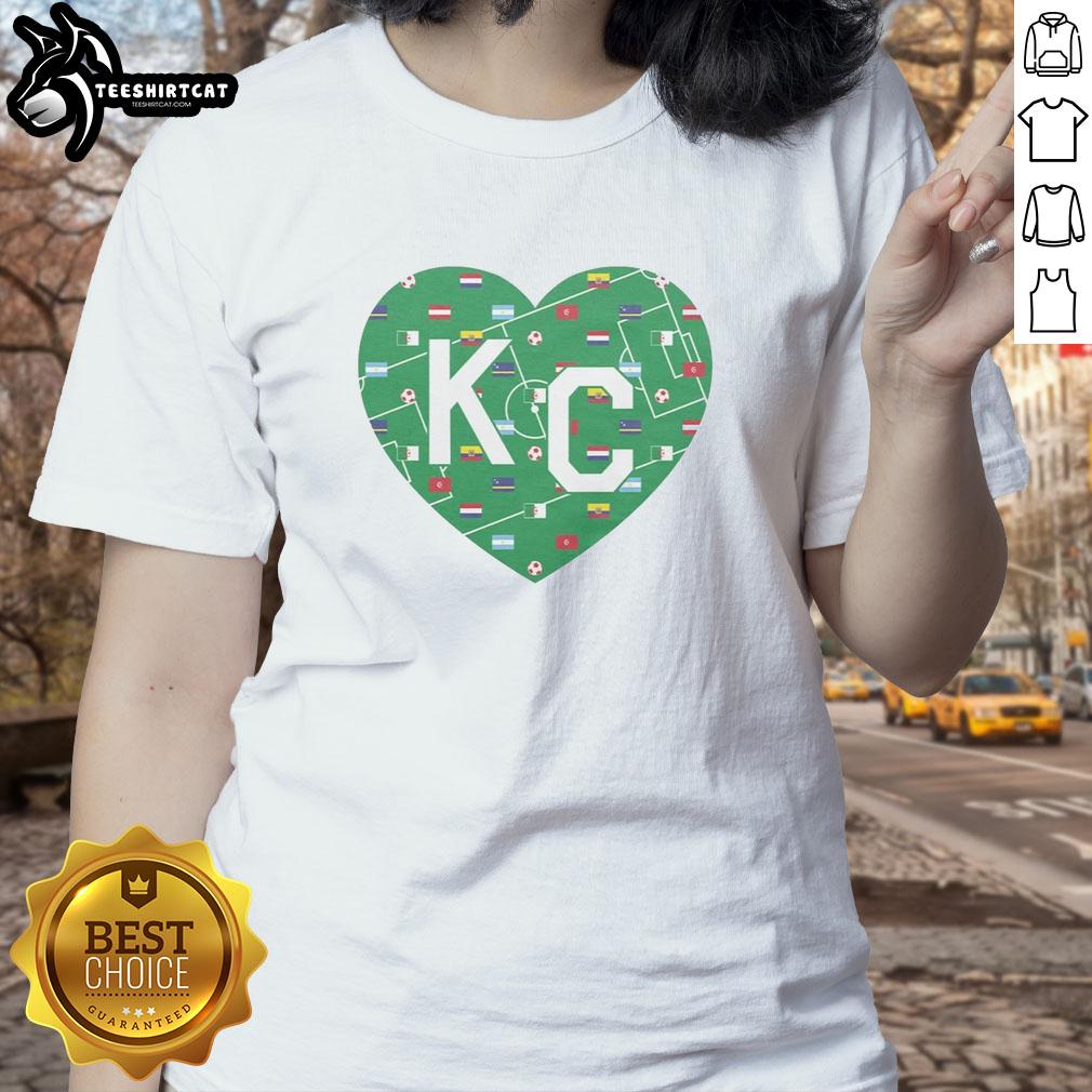 nice-soccer-field-kc-heart-vintage-ladies-tee Vintage ladies tee featuring a design of a nice soccer field and Kansas City heart, perfect for soccer enthusiasts.