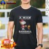 Alt Text: Peanuts X St Louis Cardinals t-shirt featuring 'Never Underestimate A Man Who Plays Baseball In His Seventies' design.