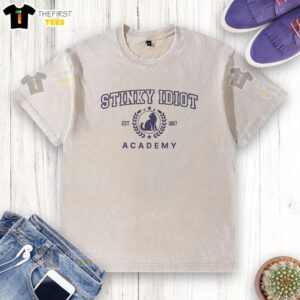 Funny Stinky Idiot Academy Est 1867 washed t-shirt design featuring playful graphics and vibrant colors.