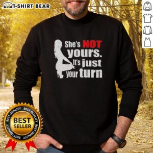 Original The Woman Squatting 'She's Not Yours, It's Just Your Turn' Sweatshirt in stylish design, perfect for casual wear.