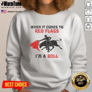 Red flags bull sweatshirt featuring bold text design, perfect for casual wear and expressing personality.