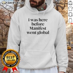 Good I Was Here Before Manifest Went Global Hoodie in black with bold text design, perfect for stylish, casual wear.