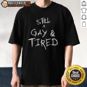 Pretty Pride statement t-shirt featuring handwritten text 'Still A Gay And Tired' celebrating LGBTQ+ identity.