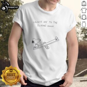 Alt Text: Premium Snoopy playing on a seesaw with Woodstock on a fun 'Launch Me To The Moon' T-shirt design.