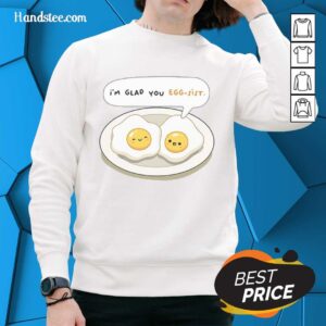 Cozy 'Pretty I'm Glad You Eggsist' sweatshirt featuring playful egg graphics, perfect for casual wear and egg lovers.