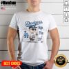 Alt Text: Charlie Brown holding coffee in Los Angeles Dodgers High Five T-shirt, showcasing a relaxed, cheerful vibe.