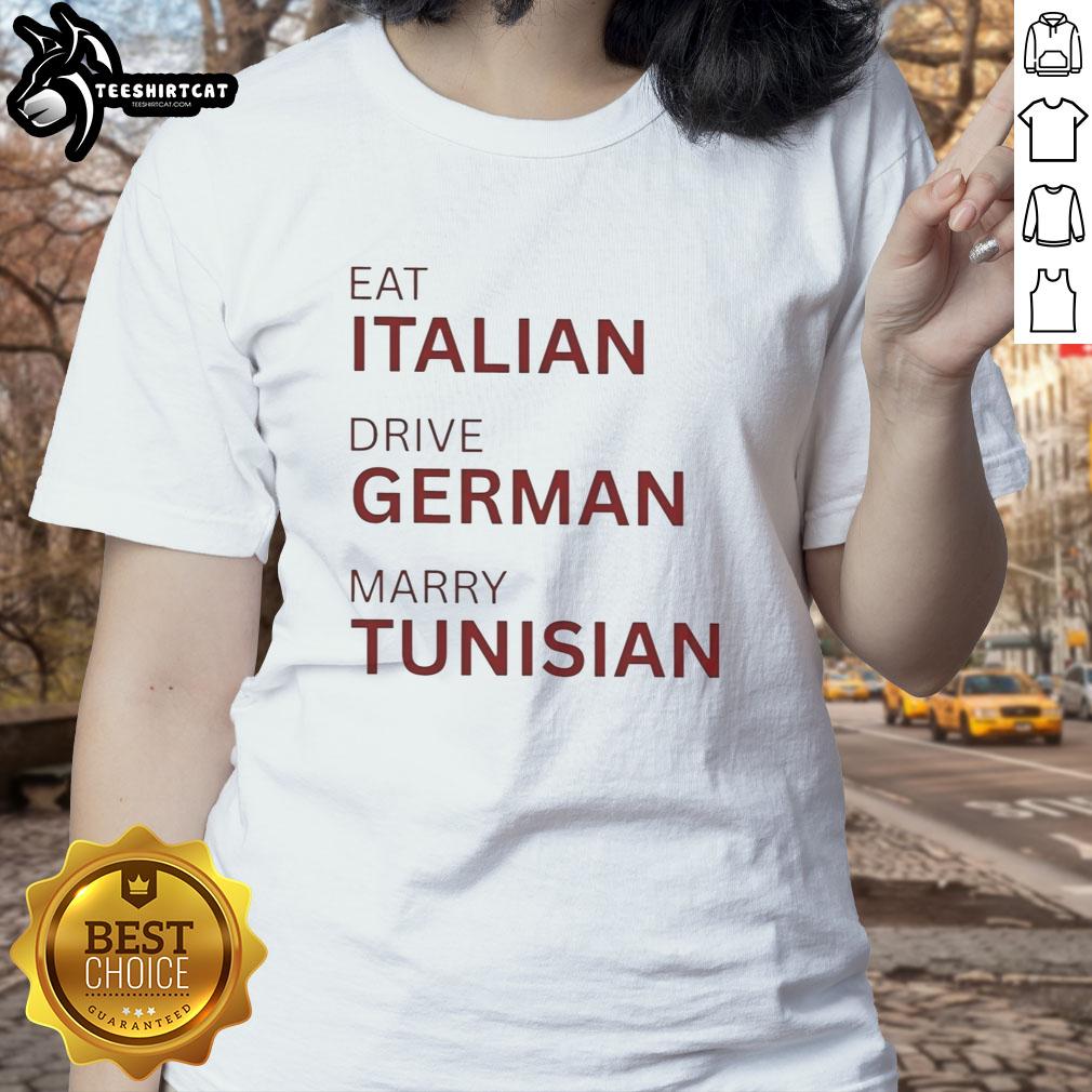 official-eat-italian-drive-german-marry-tunisian-ladies-tee Official Eat Italian Drive German Marry Tunisian Ladies Tee with bold text design on a casual shirt.