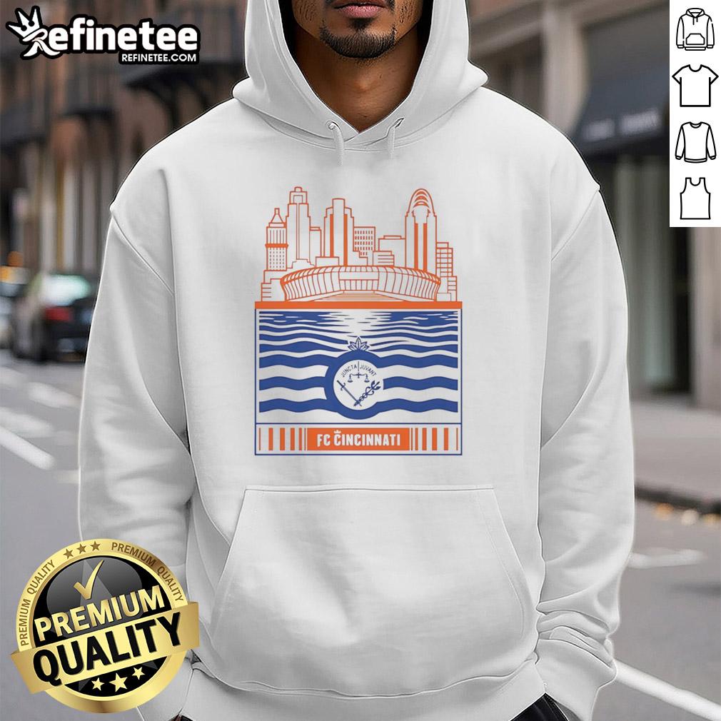 official-fc-cincinnati-city-skyline-stadium-with-river-and-logo-retro-hoodie Official FC Cincinnati retro hoodie featuring city skyline, stadium, river, and logo design.