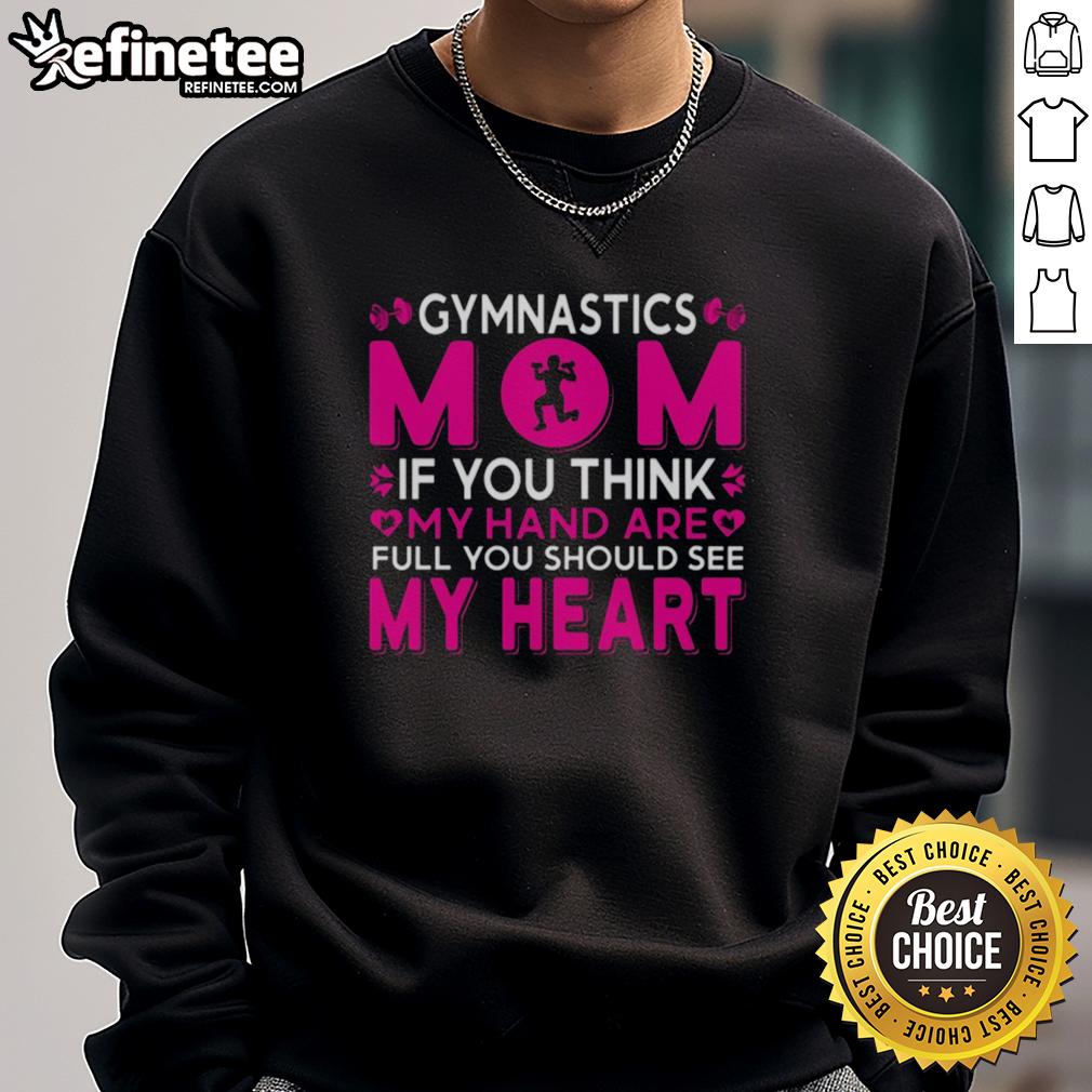 official-gymnastics-mom-if-you-think-my-hand-are-full-you-should-see-my-heart-sweatshirt Alt Text: Official Gymnastics Mom sweatshirt with heartfelt message about love and support for gymnastics athletes.
