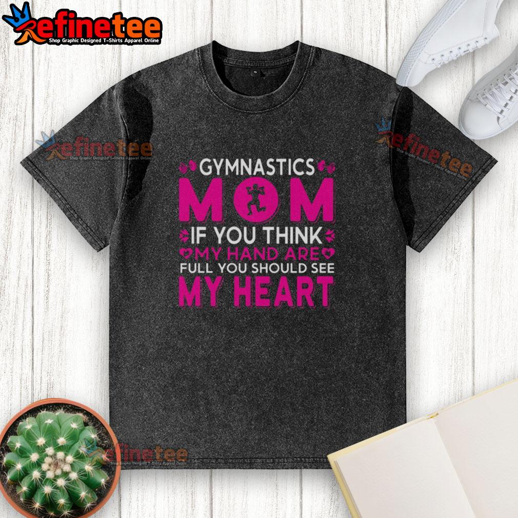official-gymnastics-mom-if-you-think-my-hand-are-full-you-should-see-my-heart-washed-t-shirt Official Gymnastics Mom t-shirt with a heart design, expressing pride in supporting gymnastics activities.