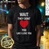 Alt Text: Official Kang Seul Gi Wait They Don't Like I Love You T-Shirt featuring vibrant design and stylish fit.