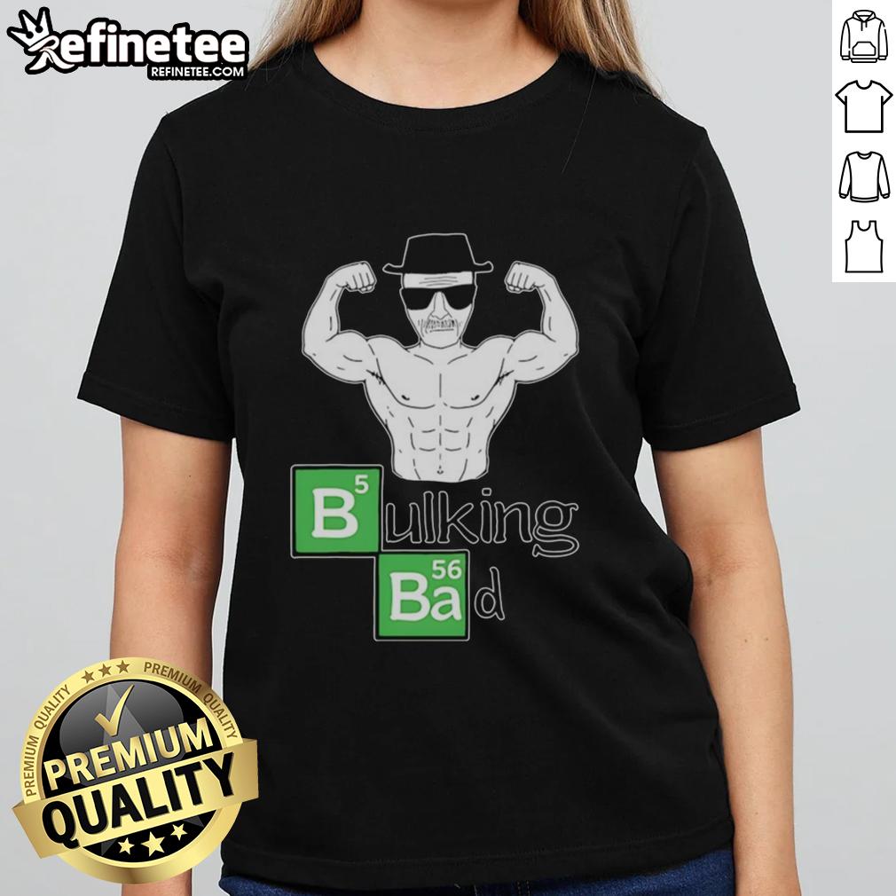 official-old-man-muscular-posing-bicep-bulking-bad-ladies-tee Muscular old man posing with biceps in a 'Bulking Bad' tee, showcasing strength and style for fitness enthusiasts.