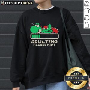 Premium Yoshi Adulting Please Wait Sweatshirt featuring a playful Yoshi graphic, perfect for gamers and casual wear.