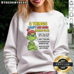 Good Grinch sweatshirt featuring '3 Things I Don't Like When Talking to Me' design, perfect for holiday humor lovers.