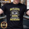 Original Green Bay Packers NFL t-shirt featuring 'I May Live In North Dakota, But My Heart Belongs To Packers' design.