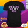 Alt Text: Original She Beats Her Bf's Ass T-Shirt featuring bold graphic for strong, empowering statement.
