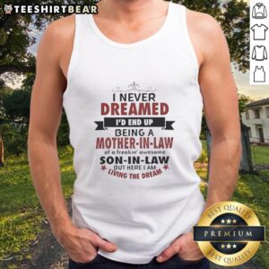 Woman wearing 'Hot I Never Dreamed I'd Be A Mother In Law Of A Freakin Awesome' tank top, showcasing playful family pride.