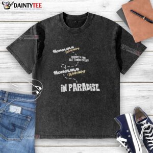 Top Honolulu Wednesday 'You Get Those Eyes In Paradise' washed t-shirt displayed on a vibrant beach background.