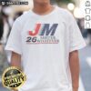 Alt Text: Premium Jm Mister Whatever 2026 T-Shirt featuring a unique graphic design and high-quality fabric, perfect for casual wear.