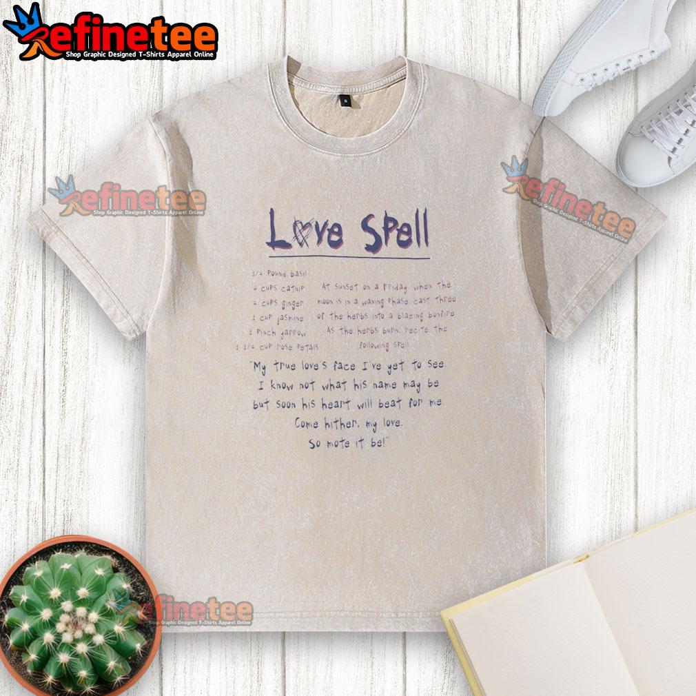 premium-love-spell-my-true-loves-face-ive-yet-to-see-i-know-not-what-his-name-may-be-washed-t-shirt Premium Love Spell washed T-shirt featuring a whimsical design about finding true love and fate.