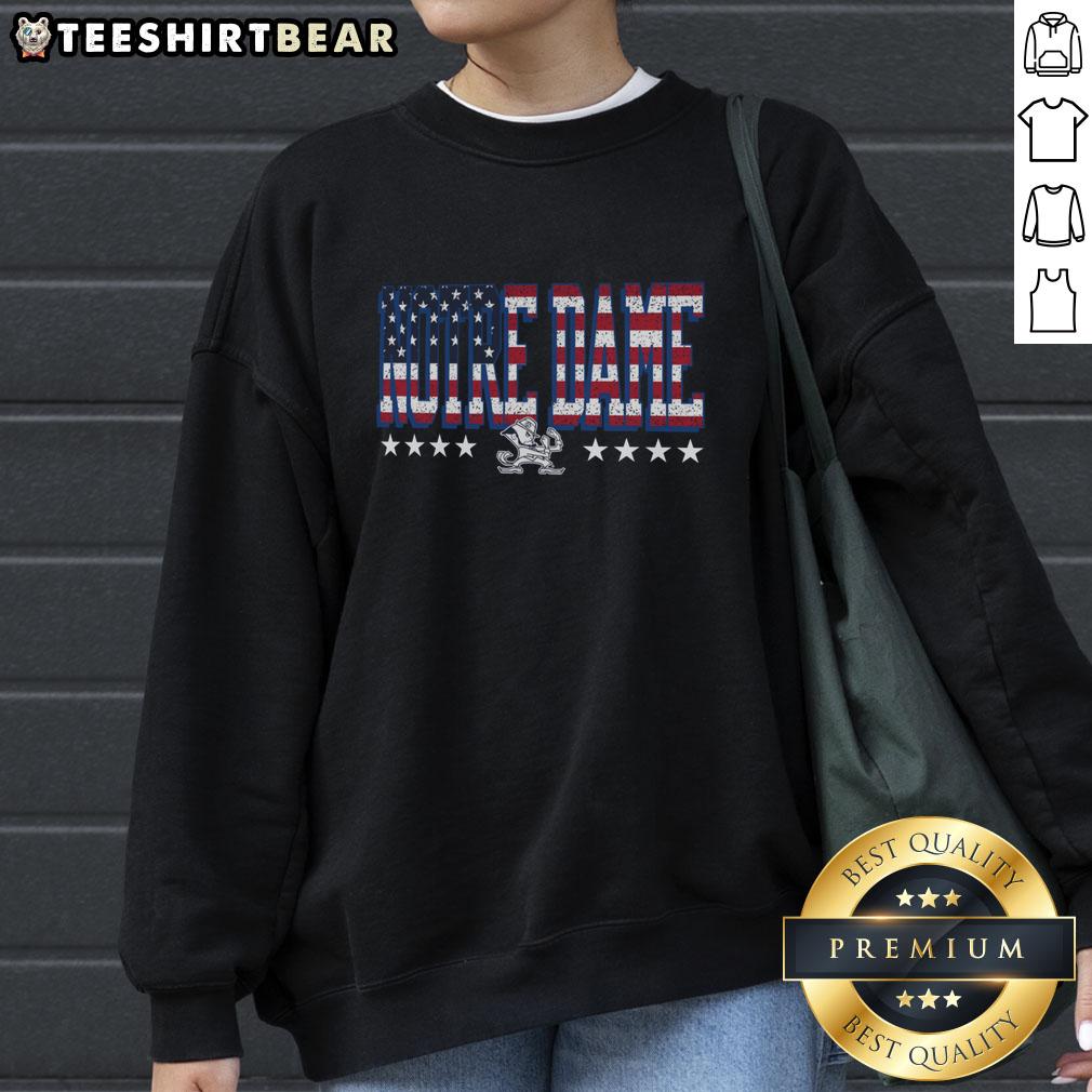 premium-notre-dame-fighting-irish-tall-type-flag-sweatshirt Alt Text: Premium Notre Dame Fighting Irish tall type flag sweatshirt featuring bold team graphics and a comfortable fit.