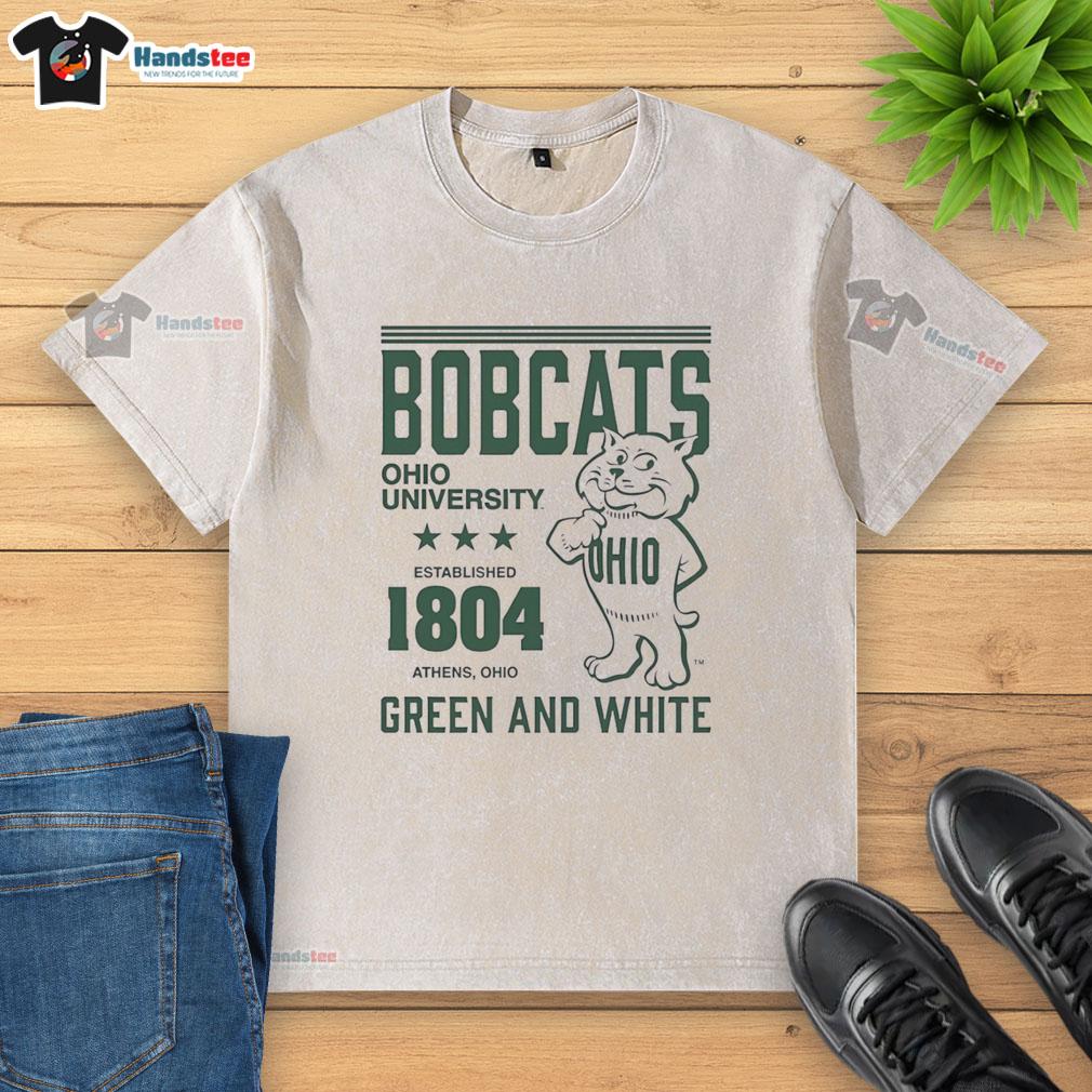 premium-ohio-bobcats-university-established-1804-vintage-washed-t-shirt Alt Text: Vintage washed t-shirt featuring Ohio Bobcats logo, celebrating the university established in 1804.