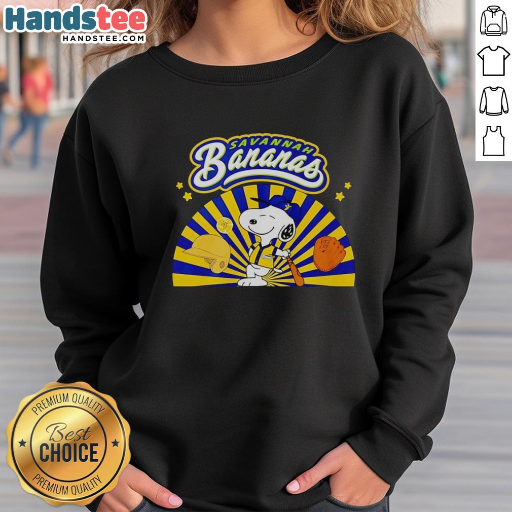 premium-snoopy-savannah-bananas-baseball-dog-batting-stance-sweatshirt Alt Text: Premium Snoopy Savannah Bananas baseball dog in batting stance on a cozy sweatshirt, perfect for pet lovers.