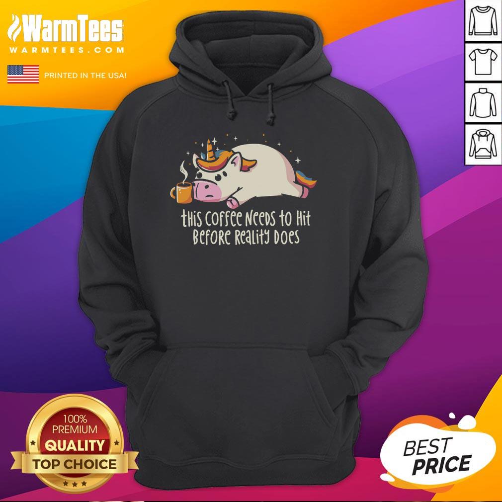 premium-this-coffee-needs-to-hit-before-reality-does-hoodie Premium hoodie featuring 'This Coffee Needs To Hit Before Reality Does' design for coffee lovers and cozy wear.