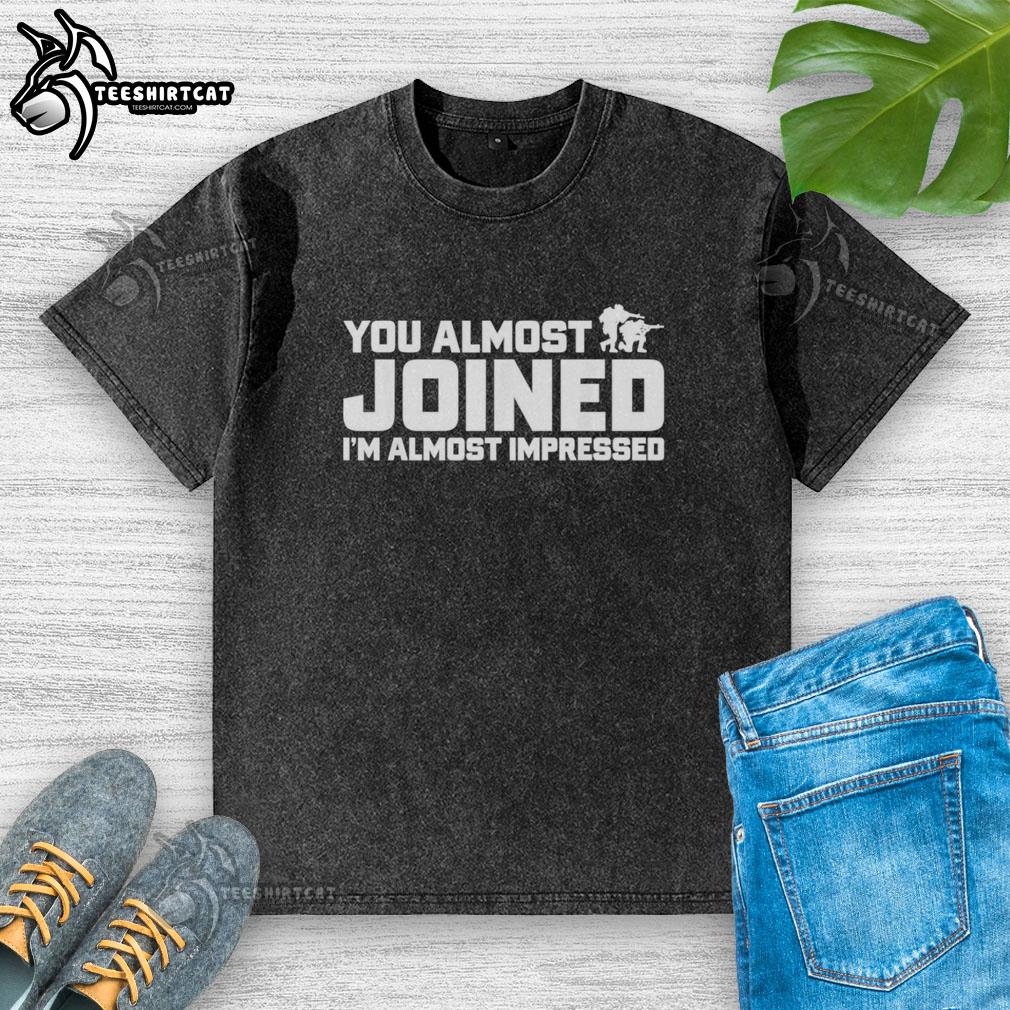 premium-you-almost-joined-im-almost-impressed-washed-t-shirt Premium washed t-shirt with 'You Almost Joined, I'm Almost Impressed' graphic design, perfect for casual wear.