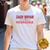 Alt Text: Premium Zach Bryan Heaven On Tour 2026 Nebraska event T-shirt featuring bold graphics and vibrant colors.