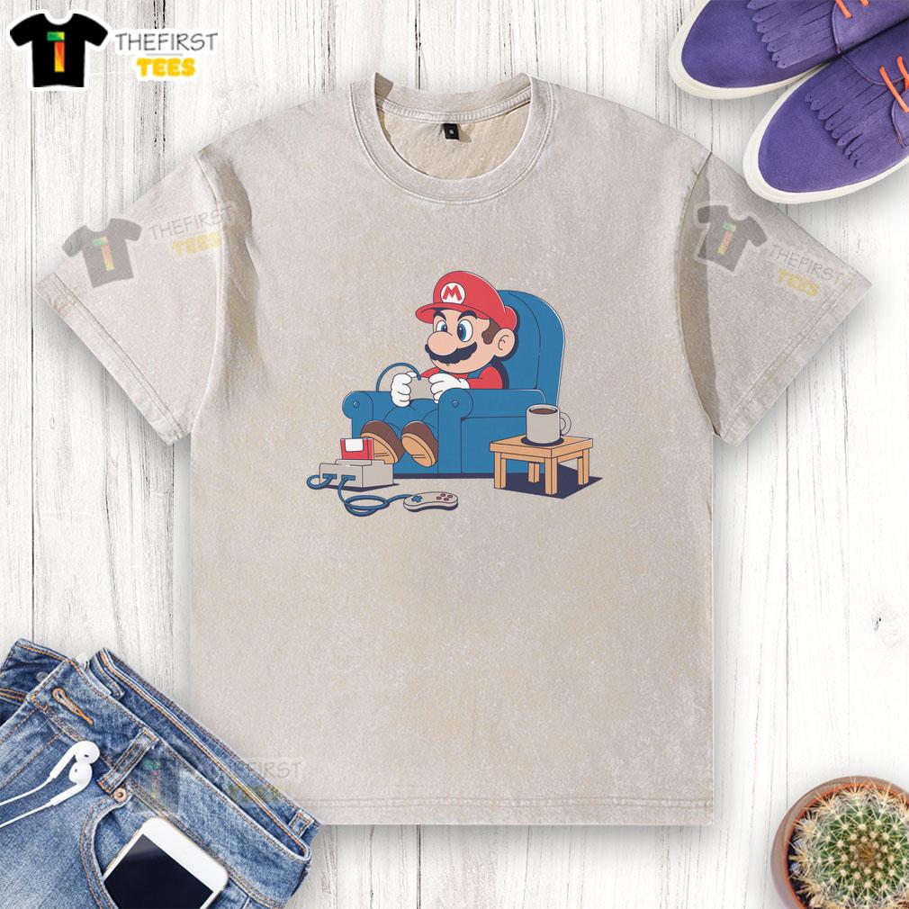 pretty-gamer-boy-mario-washed-t-shirt Stylish gamer boy wearing a Mario washed t-shirt, showcasing a vibrant design perfect for gaming enthusiasts.